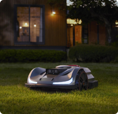 Robot lawn mower at night